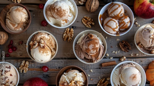 Assorted gourmet ice cream in bowls on a rustic wooden table with nuts and autumn fruits.