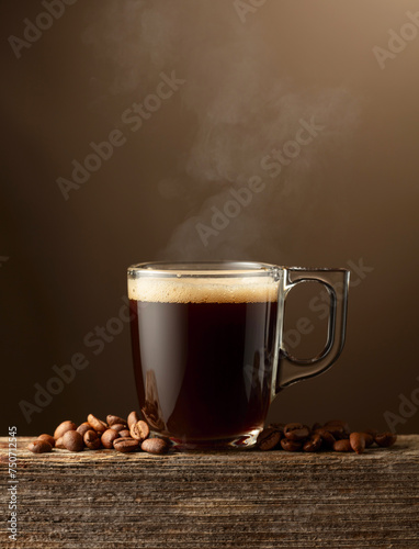 Espresso coffee glass cup on a brown background.
