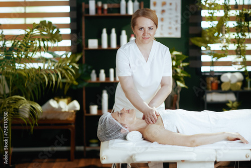 medical massage therapist massaging clients chest