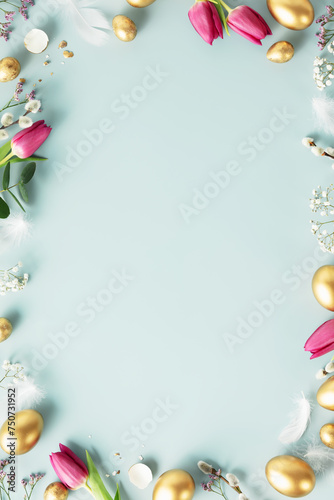 Happy Easter concept with golden easter eggs, feathers and spring flowers