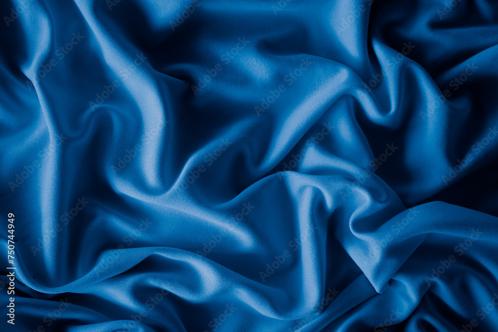 Blue Satin Silk Fabric Texture with Smooth Luxury Wave Design Blue Satin Silk Fabric Texture with Smooth Luxury Wave Design
