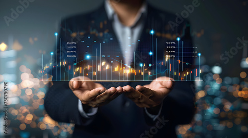 Businessman holding a Data analytics report, key performance indicators and stockmaret on his hands