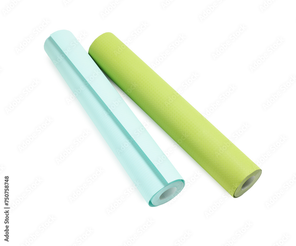 Two colorful wallpaper rolls isolated on white