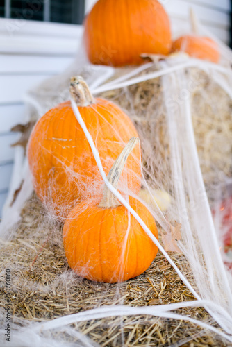 Pumpkins on hay bale.