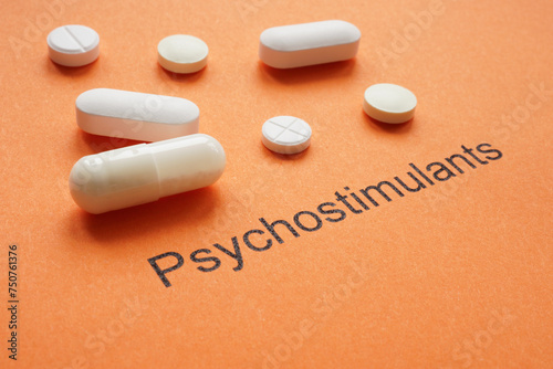 Psychostimulants concept. Close-up of pills on paper.