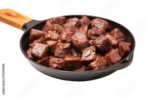Close-Up of a Frying Pan Filled With Meat. This close-up shot showcases a frying pan filled with sizzling and caramelizing meat. The meat appears to be cooking evenly and is releasing its juices.