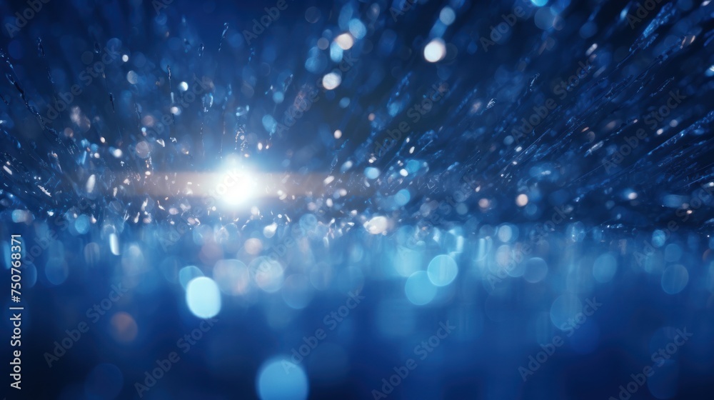 Background for graphic concept work, Blue glitter particles falling in light rays Background for graphic concept work, Blue glitter particles falling in light rays