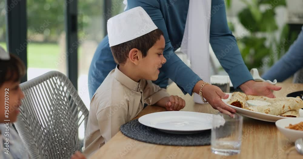Muslim, family and kids with food or lunch in dining room for eid ...