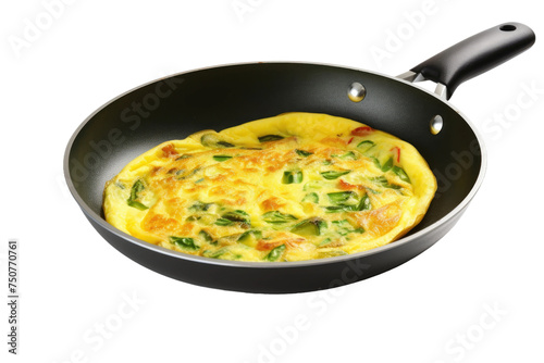 Omelet Cooking in Frying Pan. An omelet is cooking in a frying pan on a plain white background. The eggs are being mixed and sizzling as they cook, creating a delicious breakfast dish.