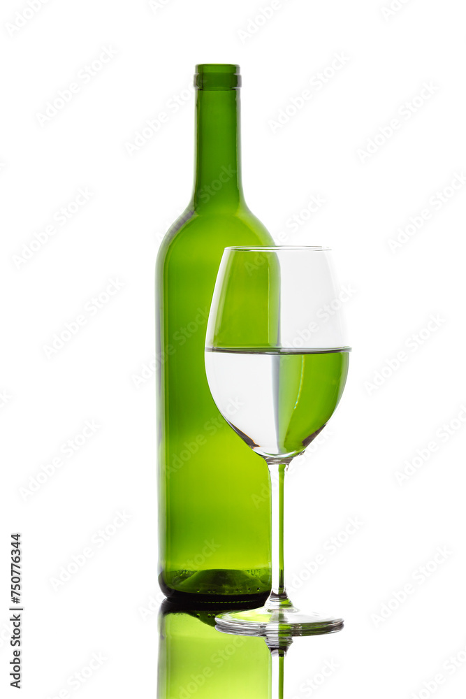 A colorful bottle with reflections in a wine glass
A colorful bottle with reflections in a wine glass