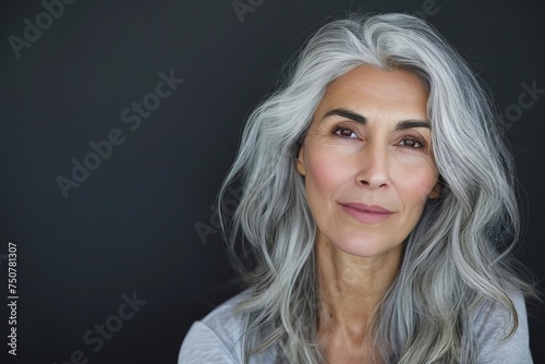 Portrait of a beautiful aging woman with graceful gray hair Representing timeless beauty and self-confidence