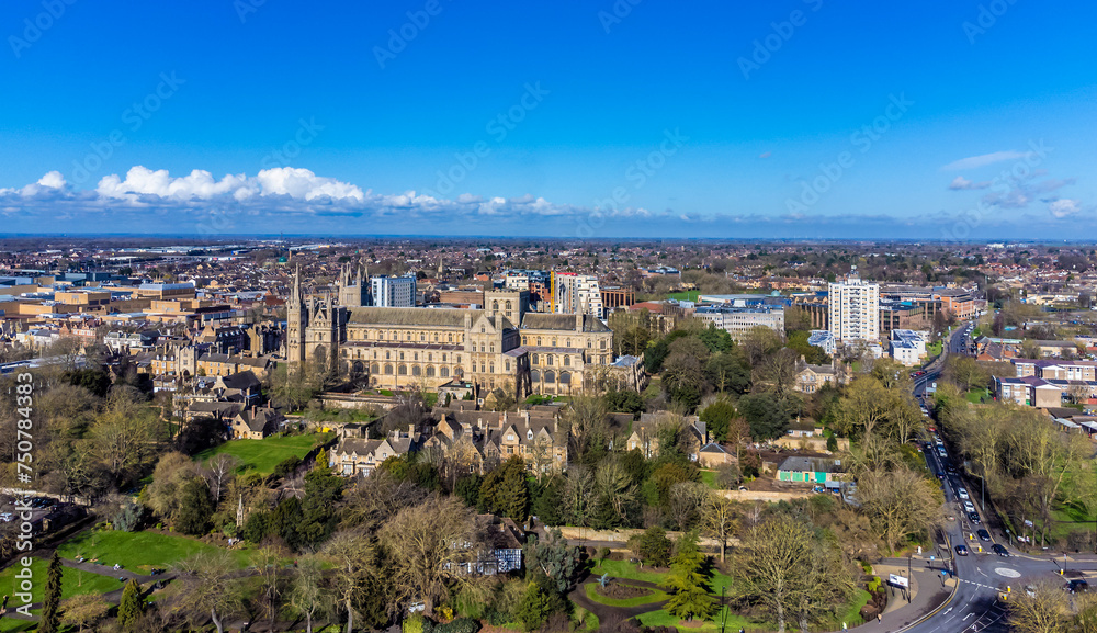 An aerial view towards the cathedral and grounds in Peterborough, UK on a bright sunny day