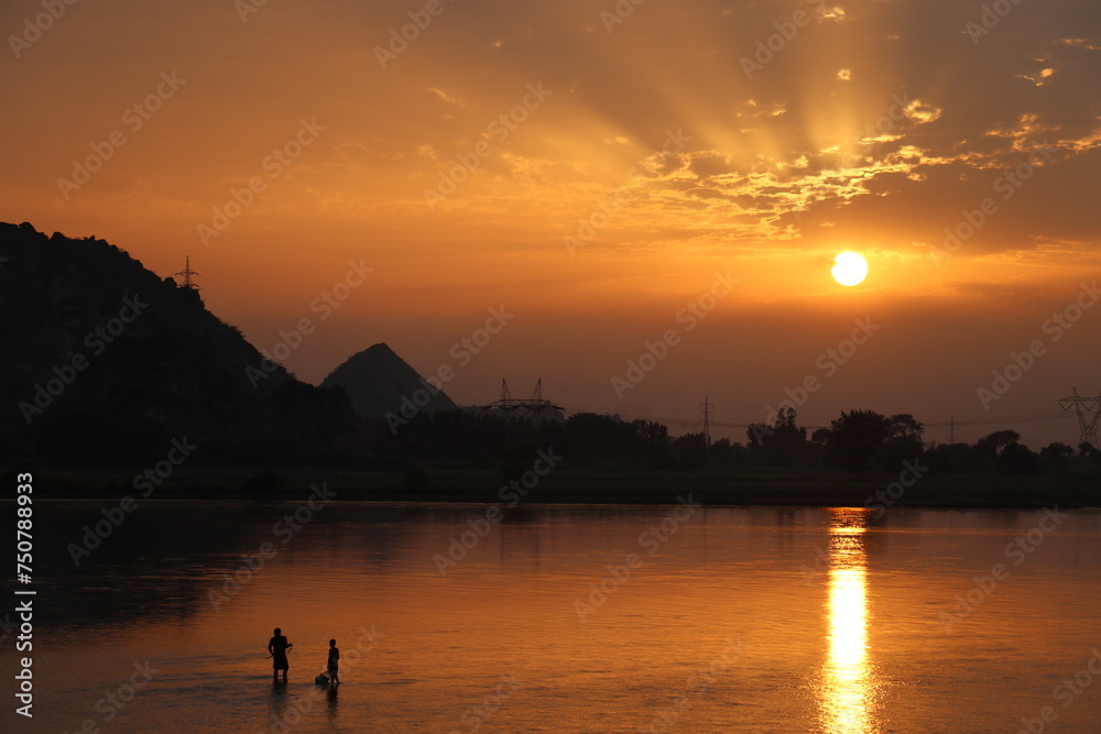 sunset on the river | Orange sunset | Fishermen | Mountains 