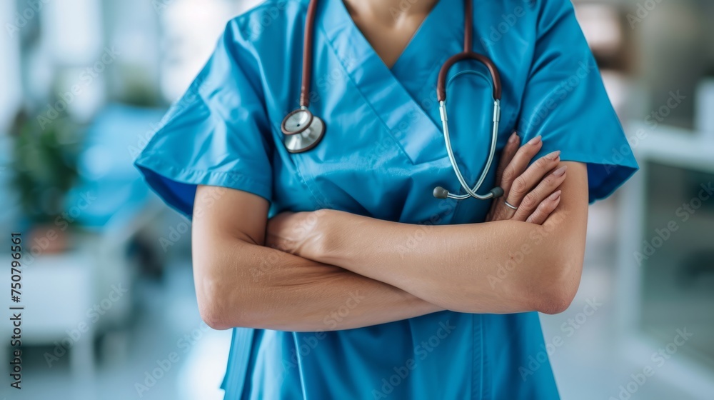 Professional Healthcare Worker in Blue Scrubs at Clinic Professional Healthcare Worker in Blue Scrubs at Clinic