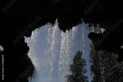 interior of a rocky waterfall cave in Vincennes park