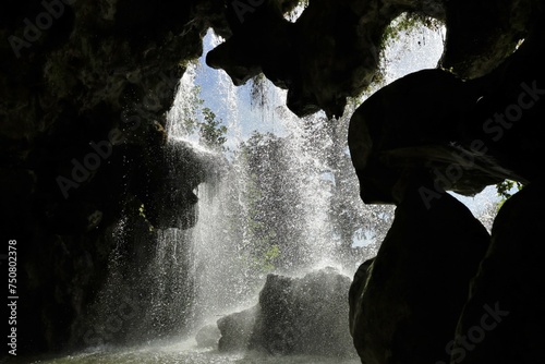 interior of a rocky waterfall cave in Vincennes park