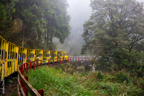 Yellow Colored Bong Bong Train in Taipingshan National Forest Recreation Area at Yilan photo