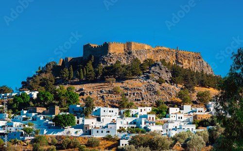 The majestic Lindos Acropolis and old town. © M-Production