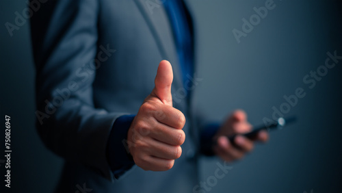 Businessman showing thumb up for good work to  successful with copy space.