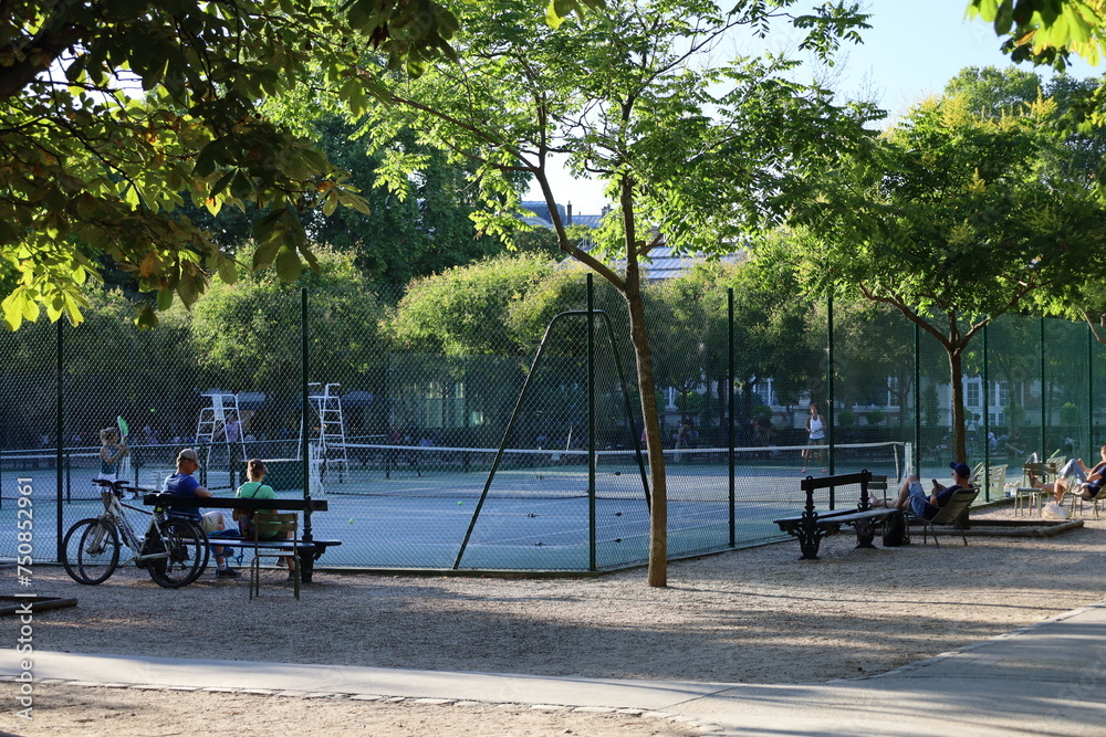 Luxembourg's garden tennis courts , famous and beautiful park in Paris , France Luxembourg's garden tennis courts , famous and beautiful park in Paris , France
