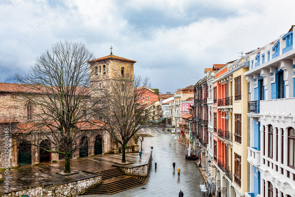 View of a typical street in Aviles, San Francisco and the church of San Nicolas de Bari. Winter
