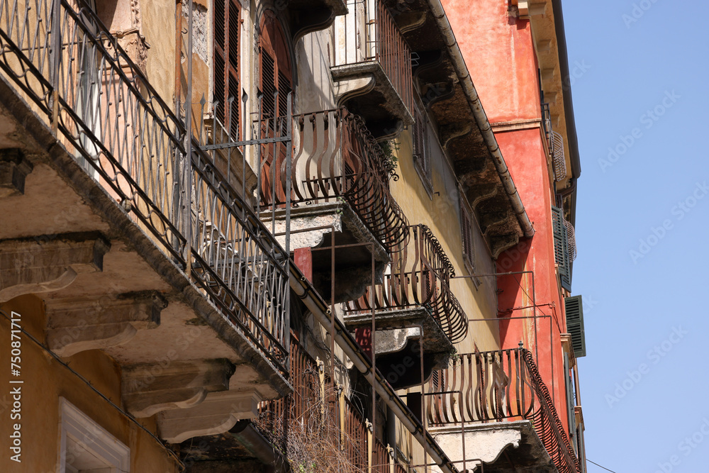 italian house facade with old balconies in Verona