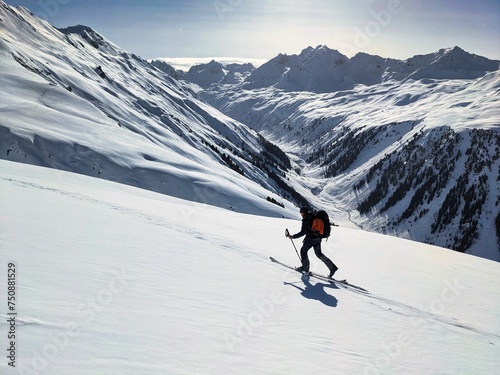 Ski tour Madrisa round tour in the Swiss and Austrian mountains. Great cross-border ski tour from Klosters to Gargellen and St.Antönien. Ski mountaineering in beautiful nature. High quality photo