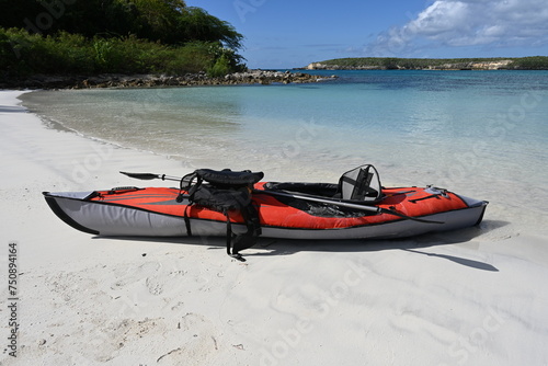 Adventure tourism - kayak on a beach.