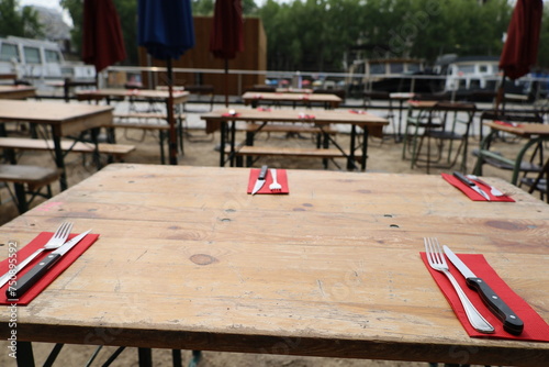 restaurant table and terrace on the Ourcq canal in Paris 19th arrondissement