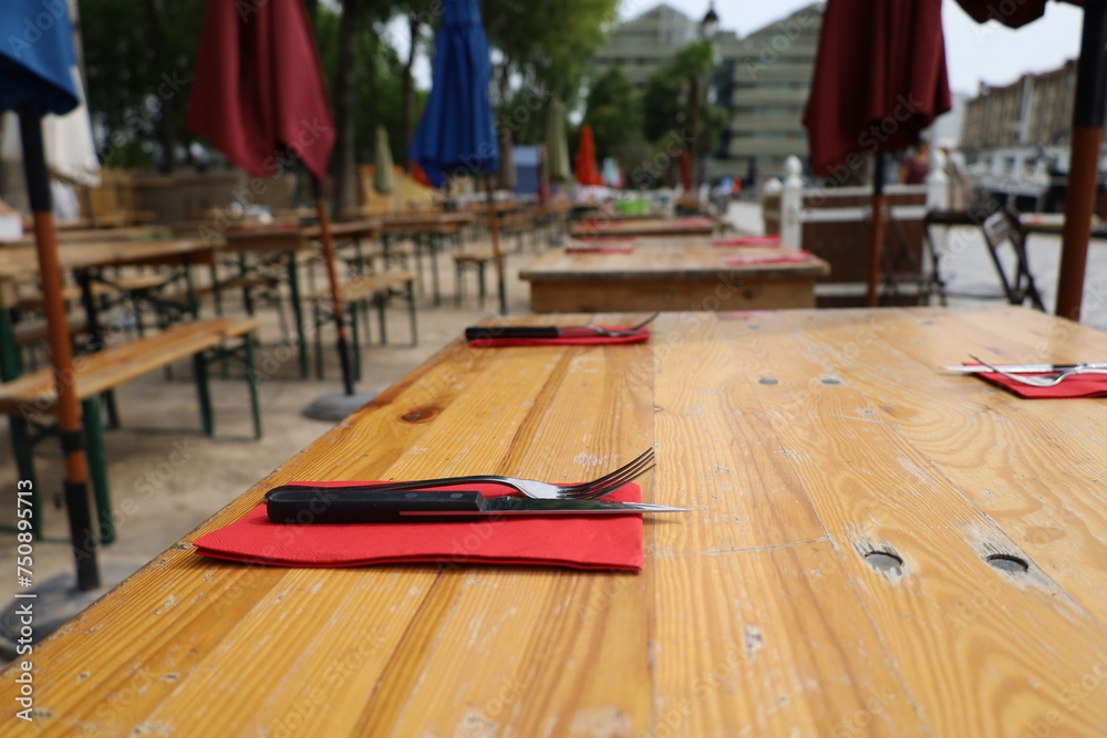 restaurant table and terrace on the Ourcq canal in Paris 19th arrondissement - obrazy, fototapety, plakaty 