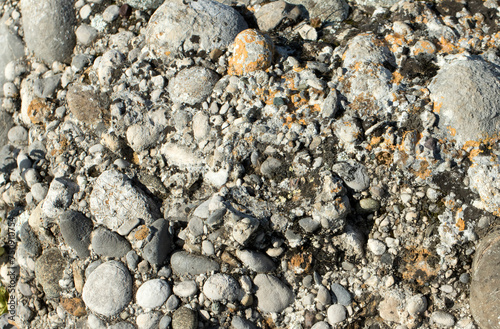Texture of a conglomerate, a clastic sedimentary rock that is composed of a substantial fraction of rounded to subangular gravel-size clasts. photo