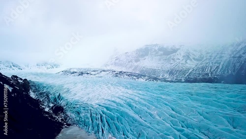 Solheimajokull is an outlet glacier of the mighty icecap of Myrdalsjokull on the South Coast of Iceland. It is the fourth-largest ice cap in Iceland. photo