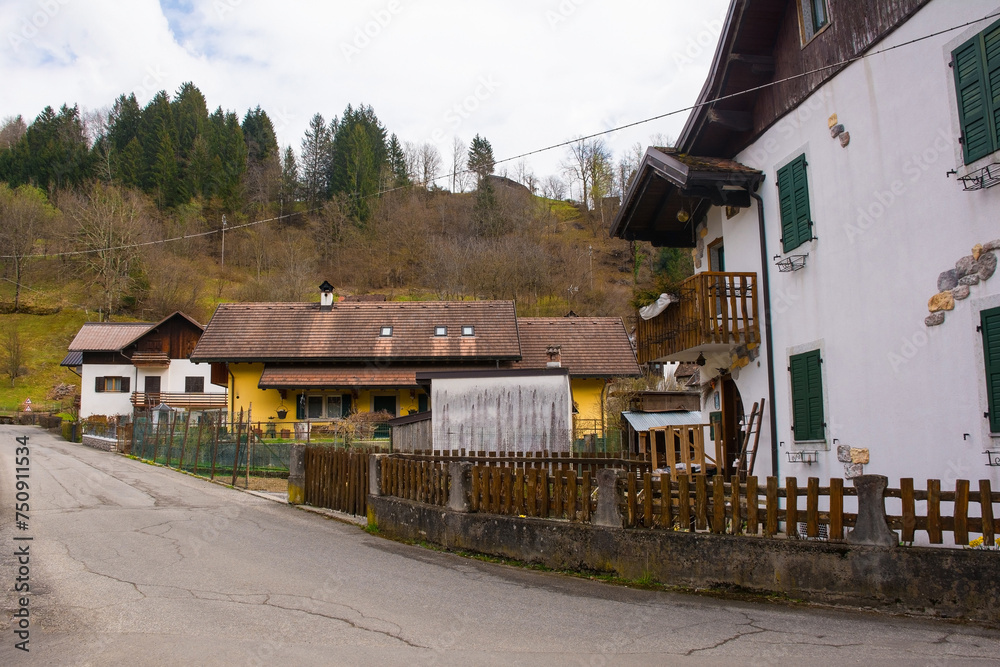 A residential street in the mountain village of Mieli near Comeglians in Carnia, Friuli-Venezia Giulia, north east Italy