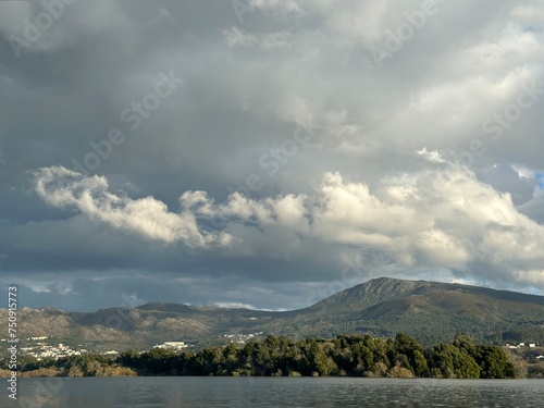 Storm clouds over the mountains and river Minho, Eiras, O Rosal, Galicia, Spain, December 2022 photo
