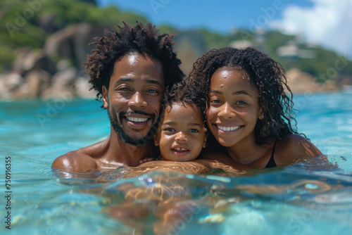 African family mom, dad and child swim on tropical sea against the background of palm trees