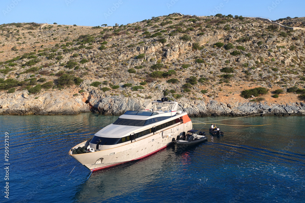 Fototapeta premium Luxury yacht anchored in Aegean island bay, Greece