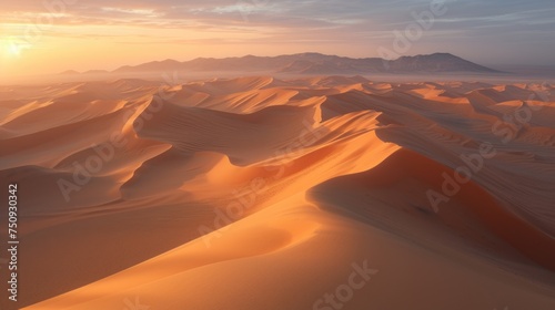 Sunrise over the desert dunes