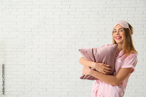 Happy young woman in sleep ...