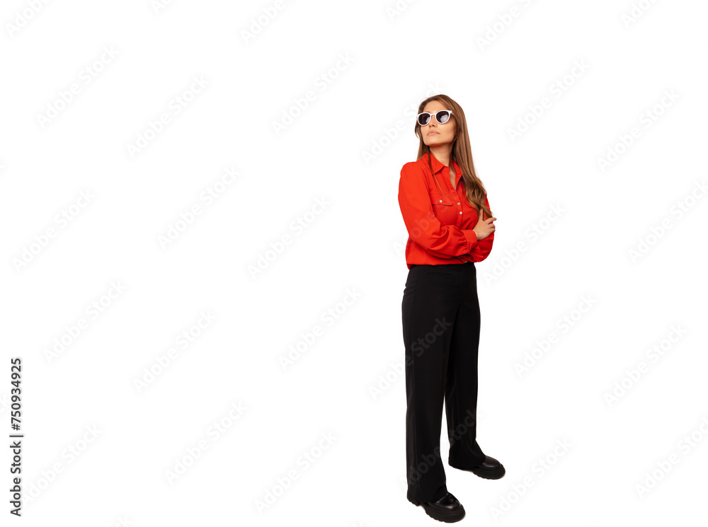 Full body studio shot of a serious young woman wearing red shirt and sunglasses holding arms folded. Full body studio shot of a serious young woman wearing red shirt and sunglasses holding arms folded.