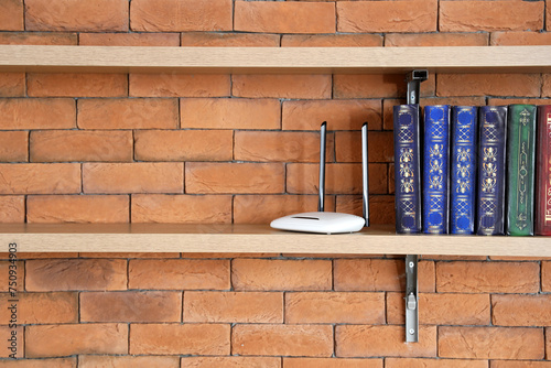 Shelf with books and wi-fi ...