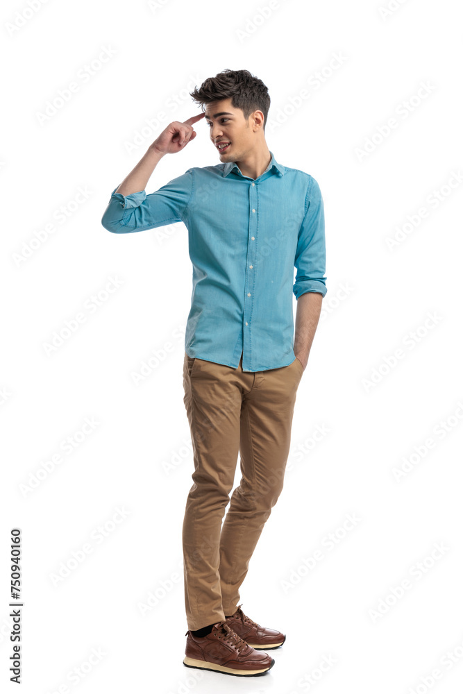 side view of relaxed casual man saluting behind side view of relaxed casual man saluting behind