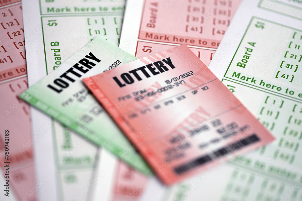Green and red lottery tickets on blank bills with numbers for playing lottery close up Green and red lottery tickets on blank bills with numbers for playing lottery close up