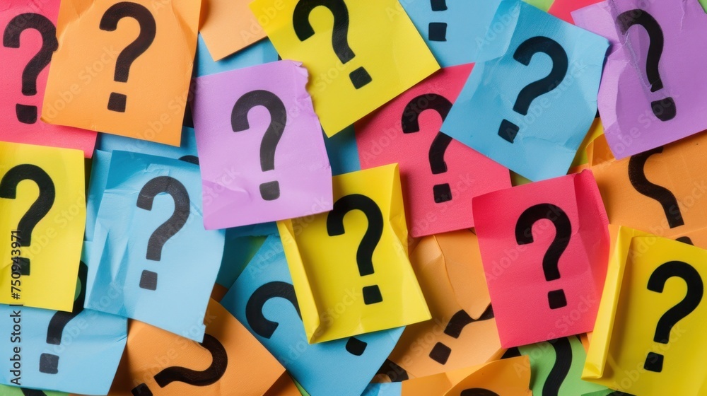a pile of multicolored paper with question marks on each of it's sides and a black question mark on the top. a pile of multicolored paper with question marks on each of it's sides and a black question mark on the top.