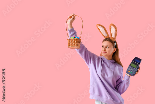 Young woman in bunny ears w...