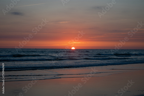 Red sunset at the beach.NEF