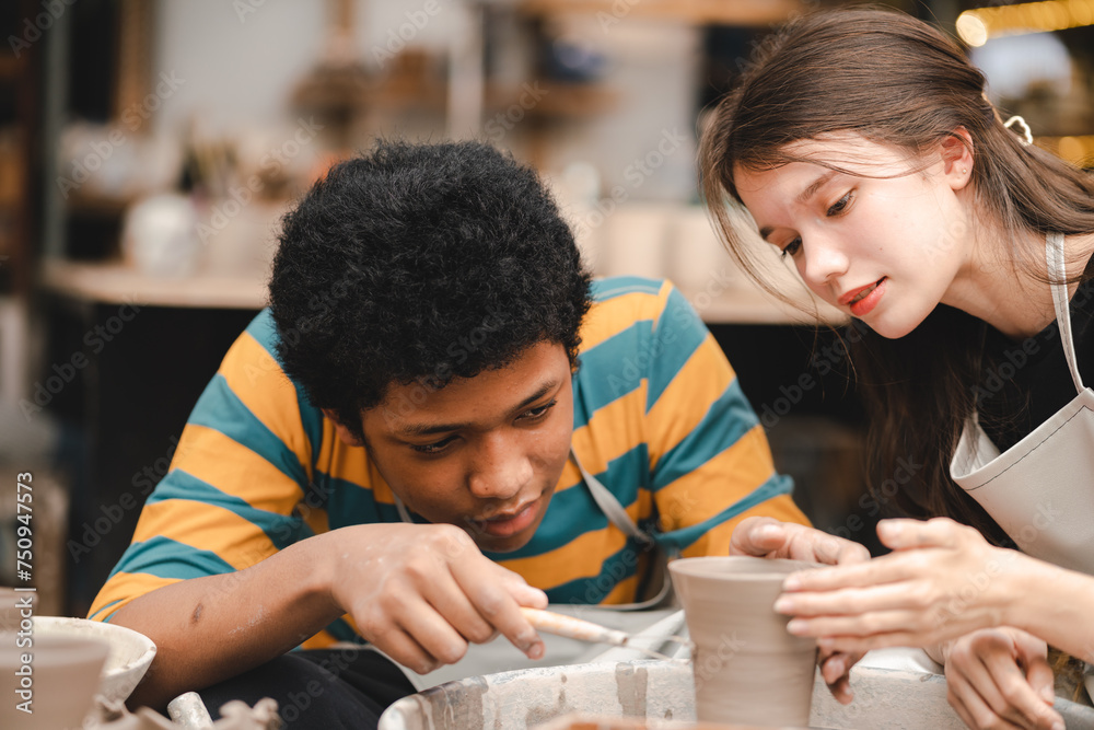 Obraz premium handcraft artist person using art skill of creativity to making ceramic clay craft pottery workshop by hand finger, wet and dirty work with mud for shape bowl traditional in hobby or manufacturing
