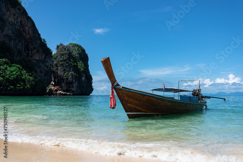 longtail boat standing near the shore in Thailand