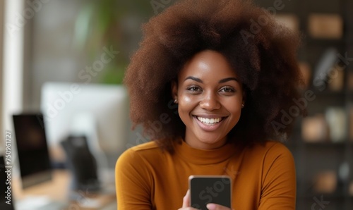 Happy africian woman using smartphone and smile.
