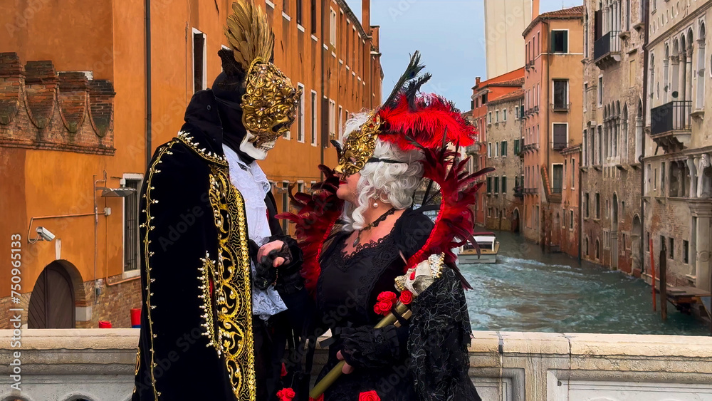 Venice Carnival. People in Venetian carnival masks and costumes on streets of Venice, Italy, Europe February 10, 2024