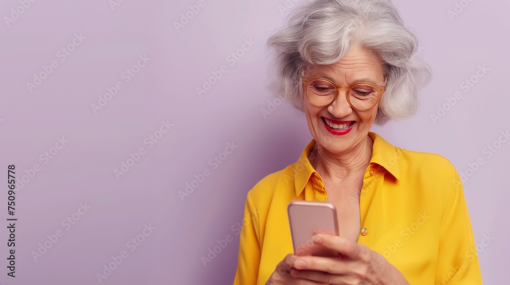 Beauty woman of 65 years old looks at the phone and smiles. Promotions and discounts, promotions at the clinic, dating site for old people, communicating with friends and family by phone Beauty woman of 65 years old looks at the phone and smiles. Promotions and discounts, promotions at the clinic, dating site for old people, communicating with friends and family by phone